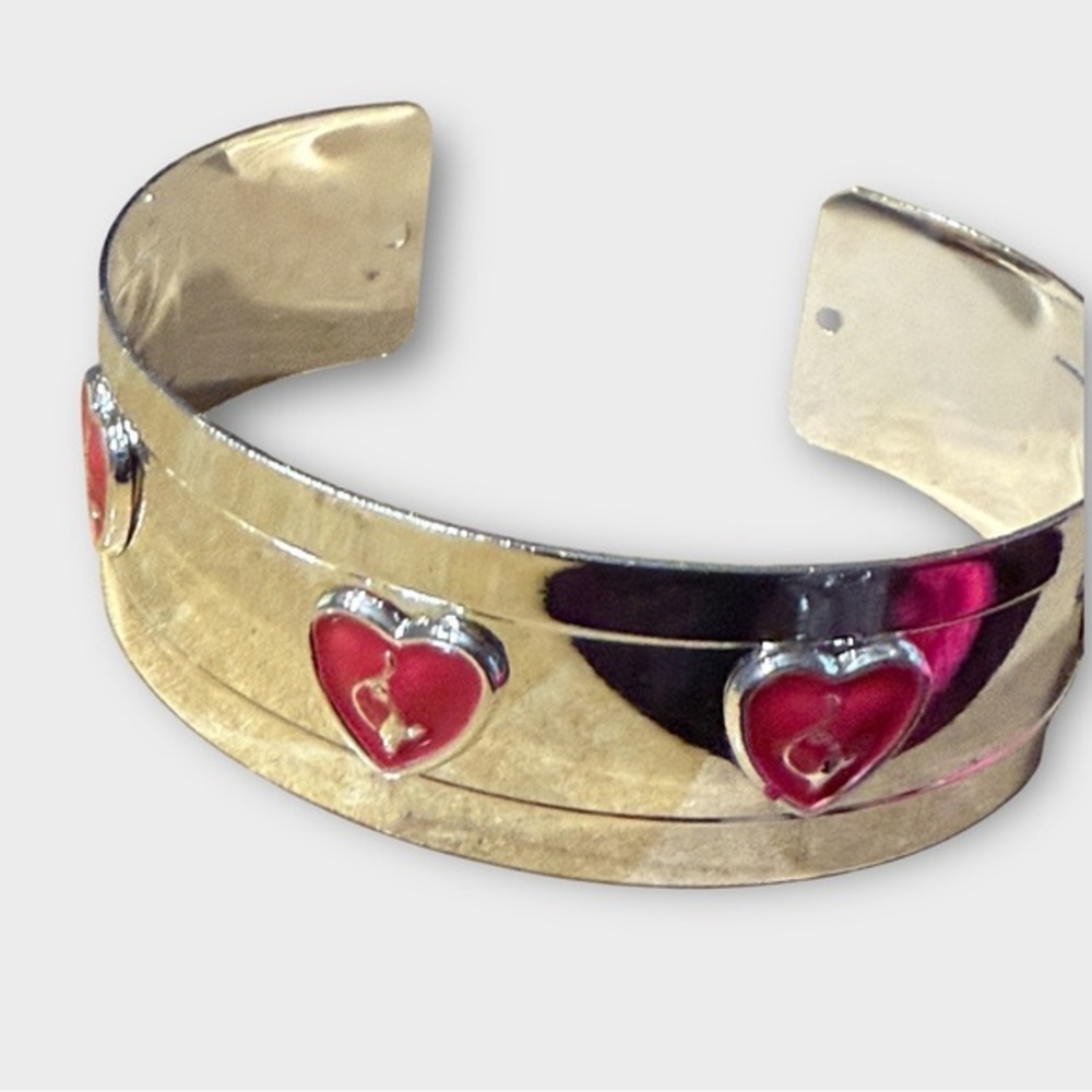 Elegant Gold Cuff Bracelet with Heart Accents